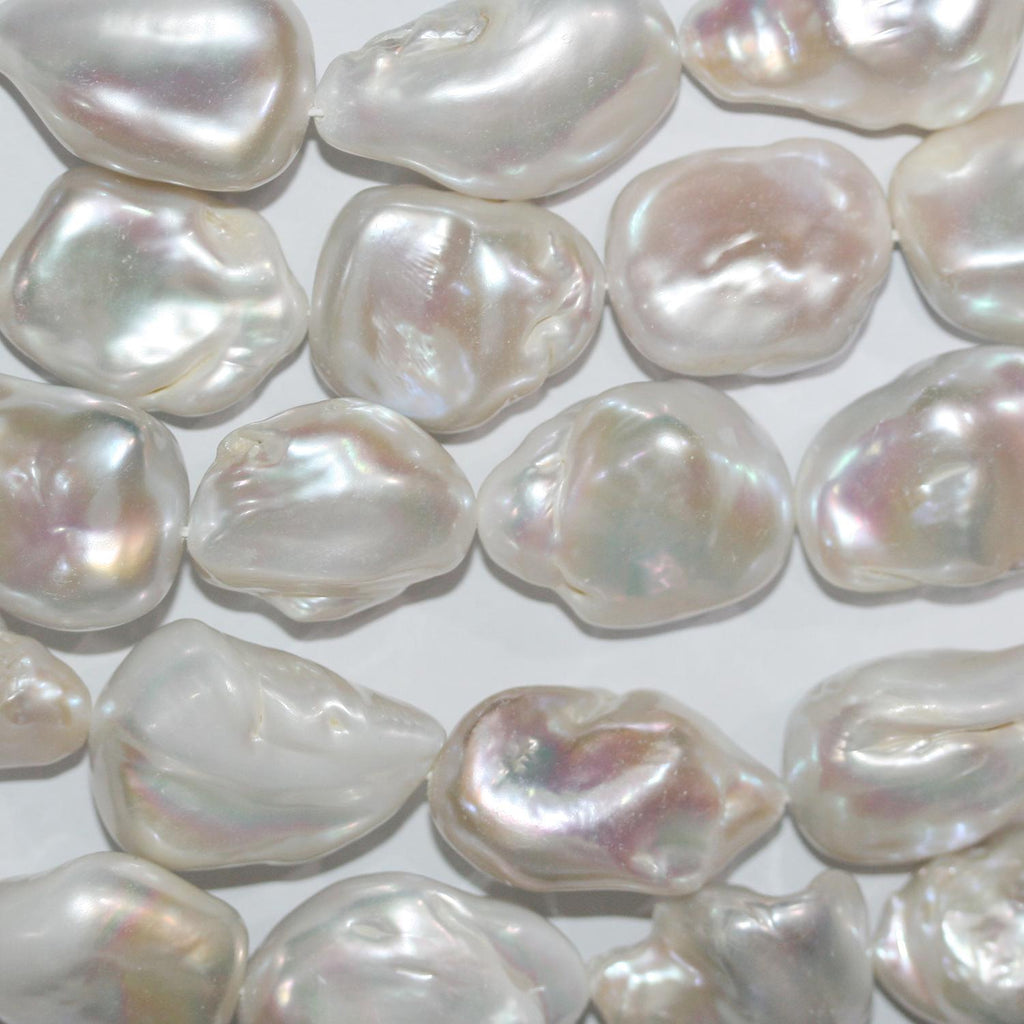 Perla Barroca de Agua Dulce de 16" (25 x 18 mm). Hilo aproximado de 40 cm. Precios al por mayor.