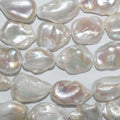 Perla Barroca de Agua Dulce de 16" (25 x 18 mm). Hilo aproximado de 40 cm. Precios al por mayor.
