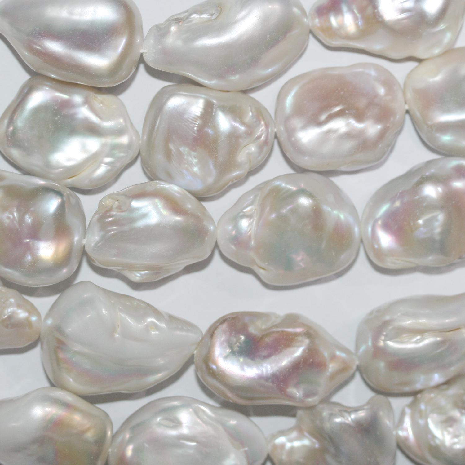 Perles baroques d'eau douce St 16" (environ 40 cm), 25 x 18 mm. Longueur du fil : 40 cm environ. Perles naturelles à prix de gros.