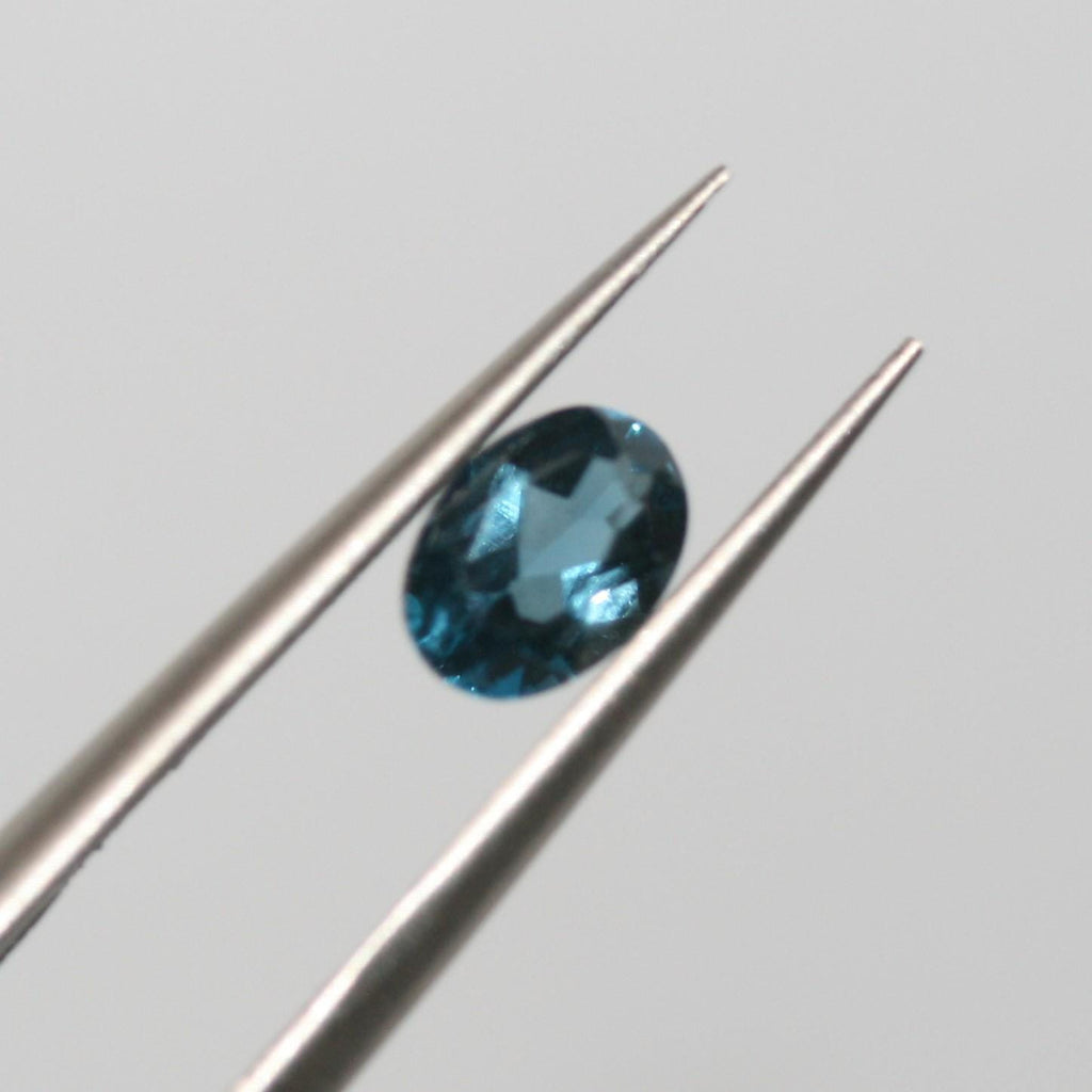 Lote de 4 piezas de topacio azul de Londres facetado ovalado de 6 x 4 mm (4 piezas)