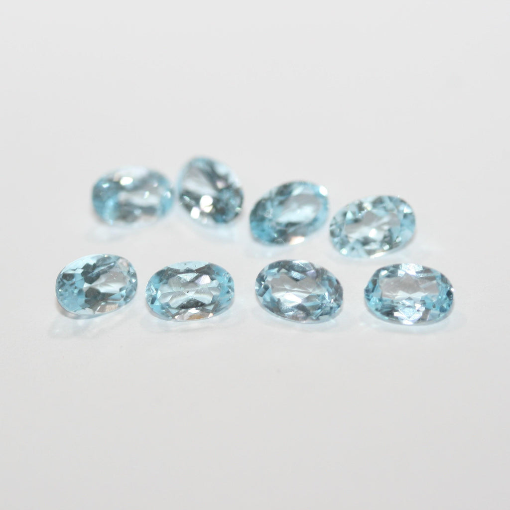 Lote de 8 topacios azul cielo facetados ovalados de 6 x 4 mm. (8 piezas).