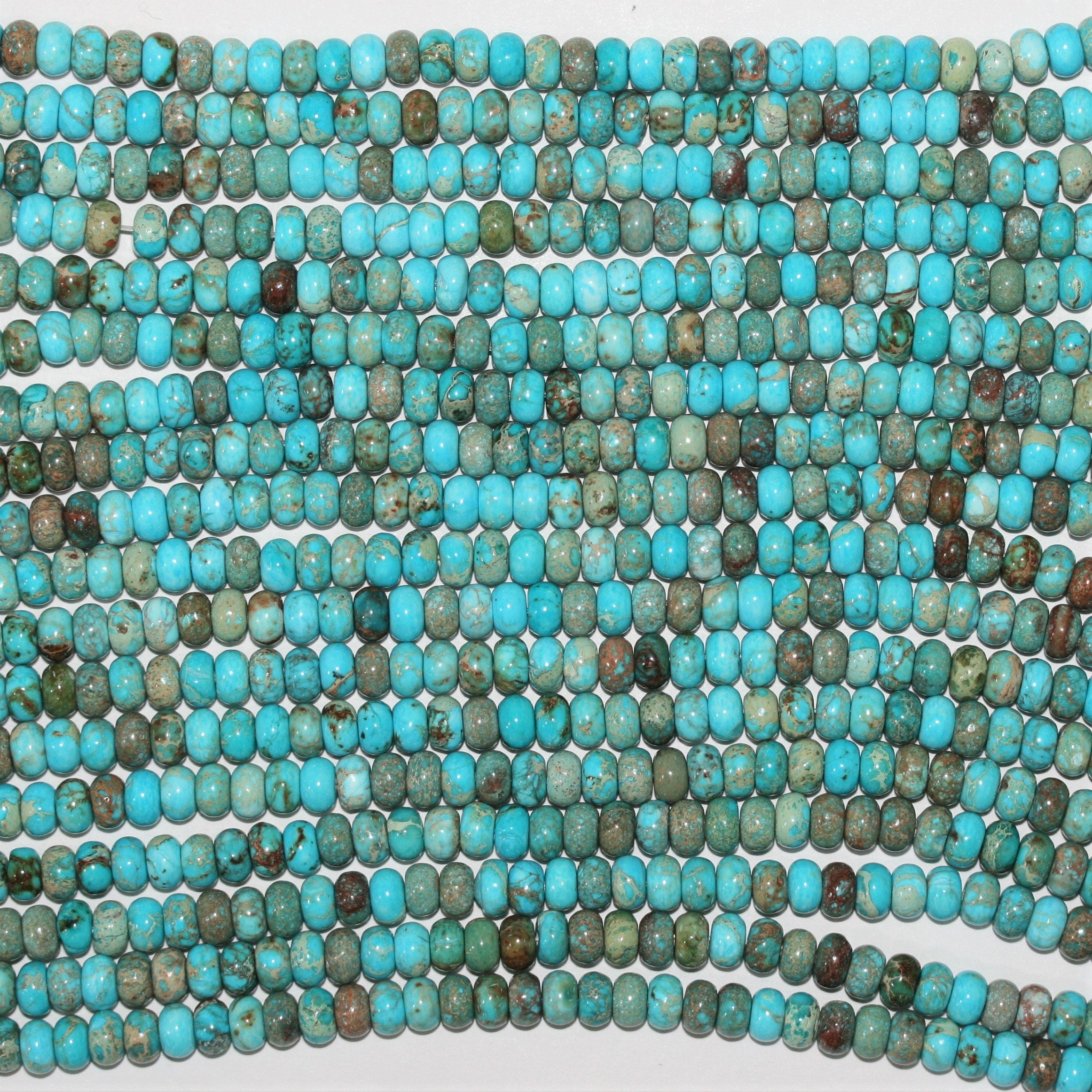 Cuentas redondas lisas de turquesa St. de 16" de 6 x 4 mm - Hilo de 41 cm.