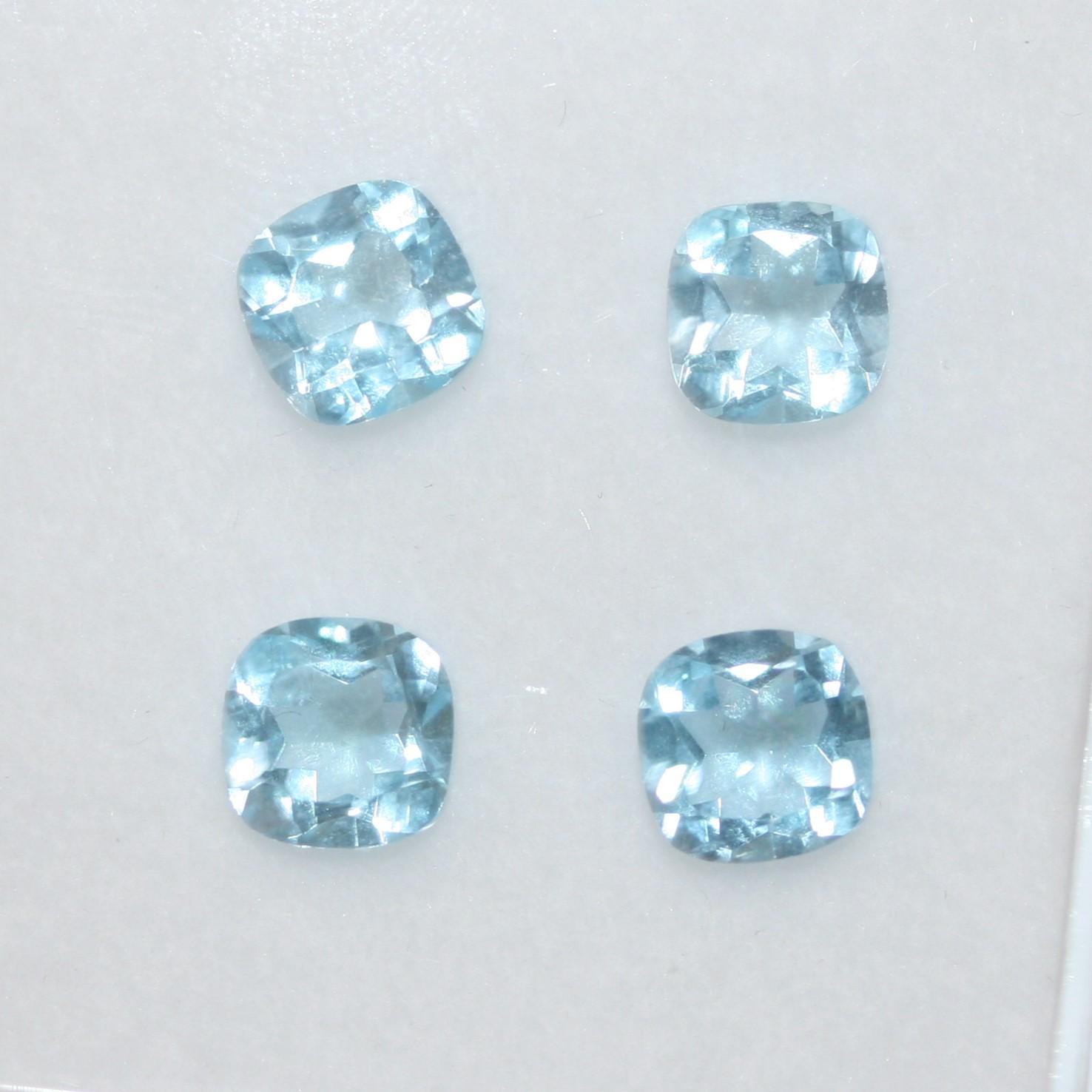 Lote de 4 piezas de topacio cielo facetado cojín de 6 mm. (4 piezas).