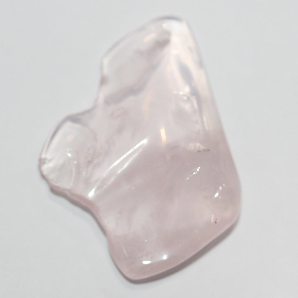 Pendentif irrégulier en quartz rose brut, environ 45 x 30 mm (1 pièce).