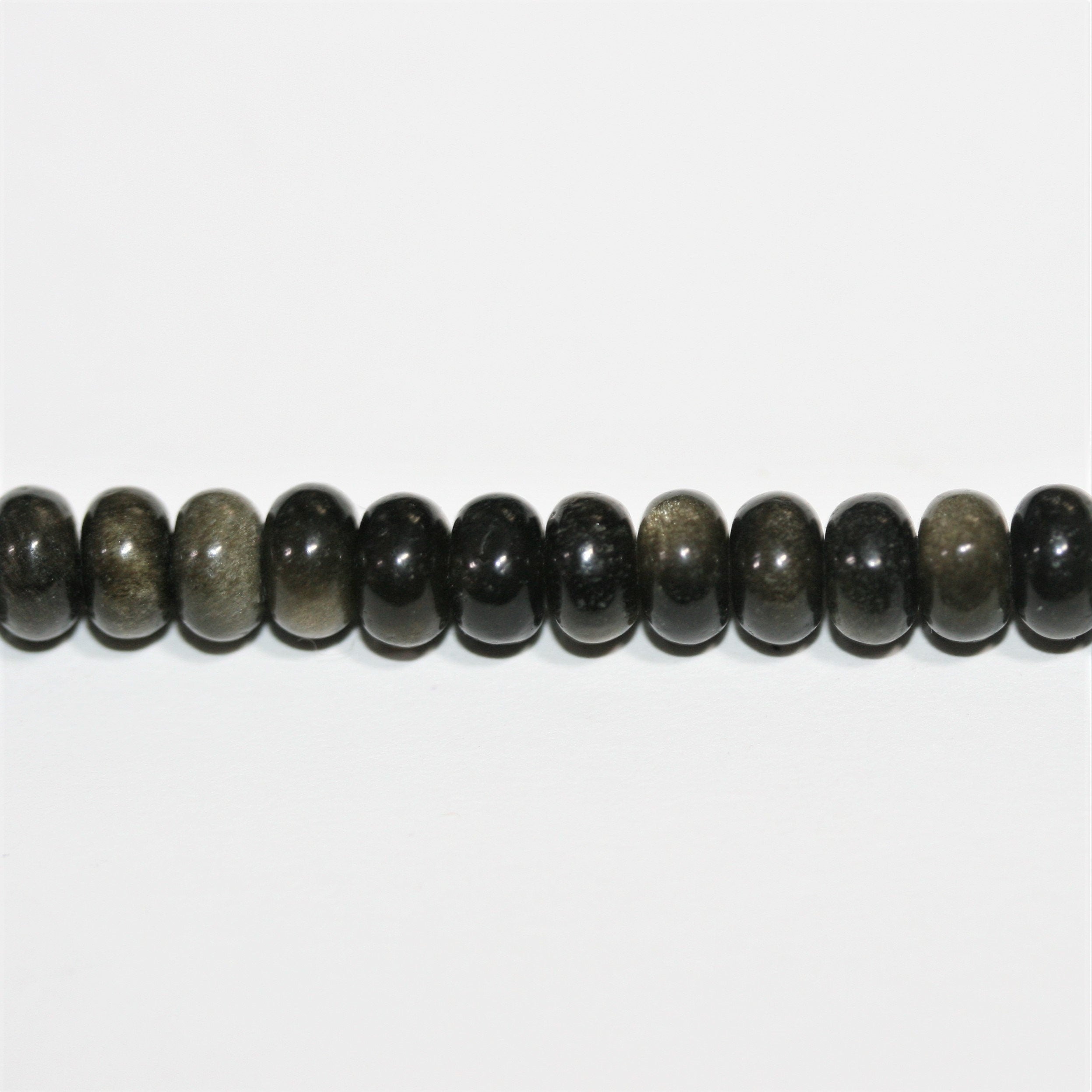 Perles rondelles lisses en obsidienne St 15" 6x4mm.- Brin 39cm.