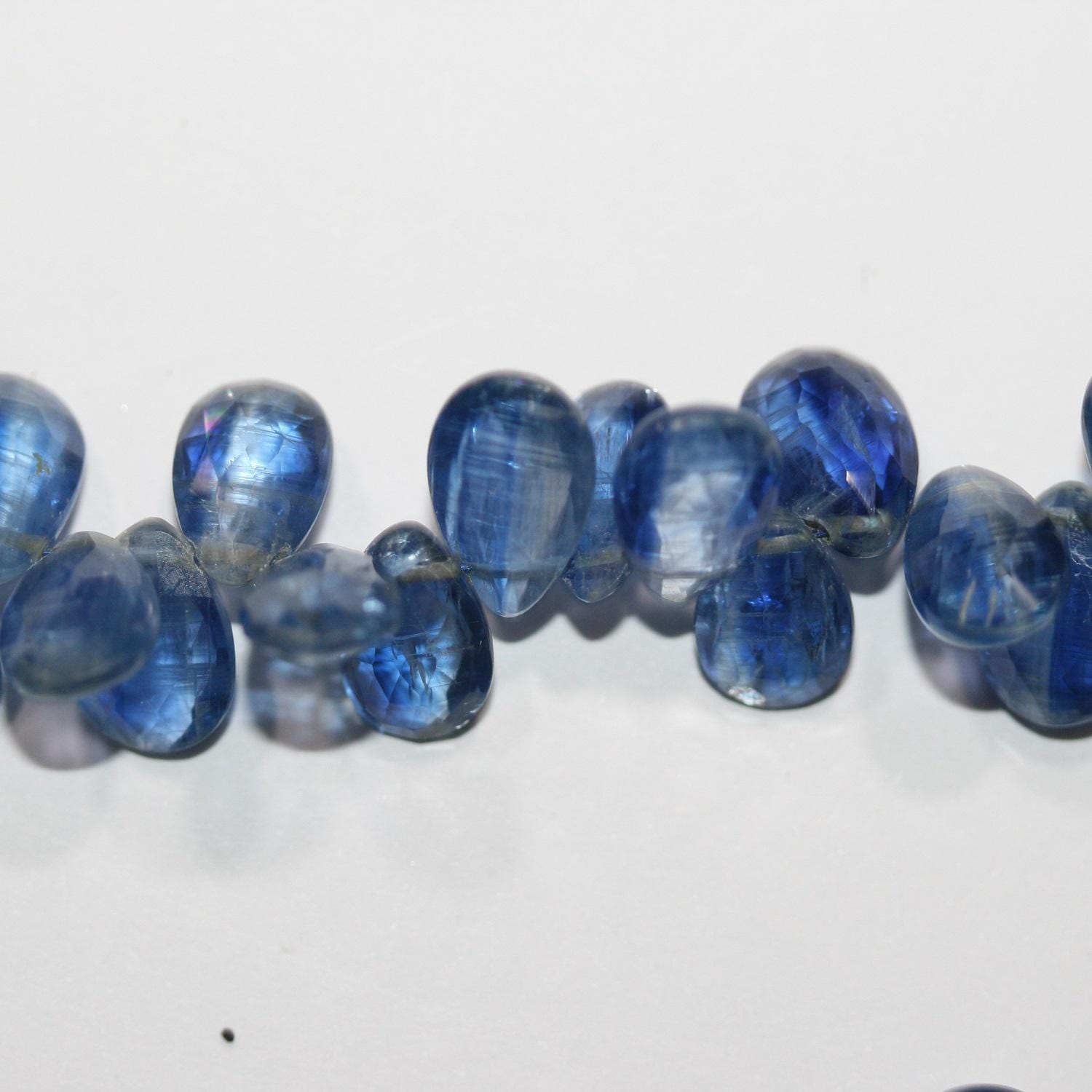 Perles en kyanite facettées de 20 cm (8 pouces), 9 x 6 mm environ - Longueur du fil : 20 cm