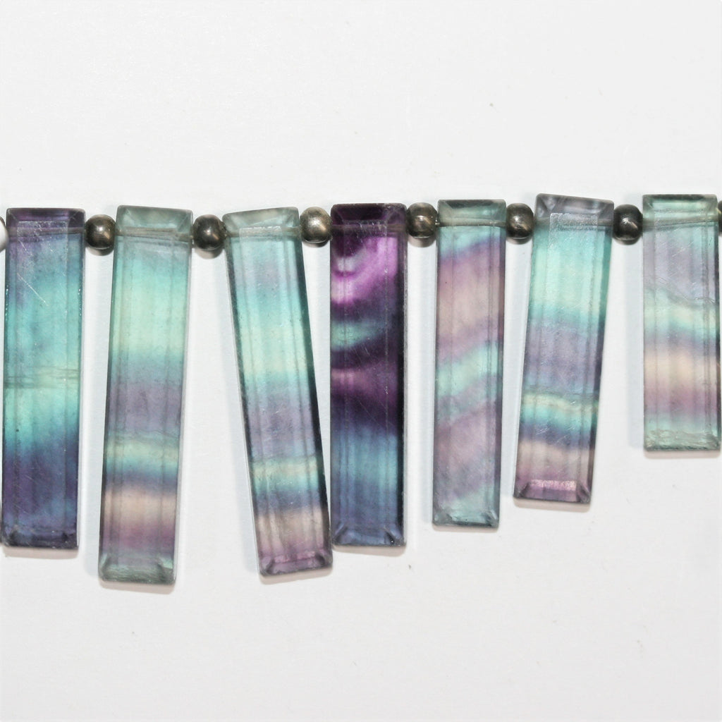 Cuentas rectangulares facetadas de fluorita de 4", 22 x 6-33 x 7 mm. Aprox. - Hilo de 10 cm.