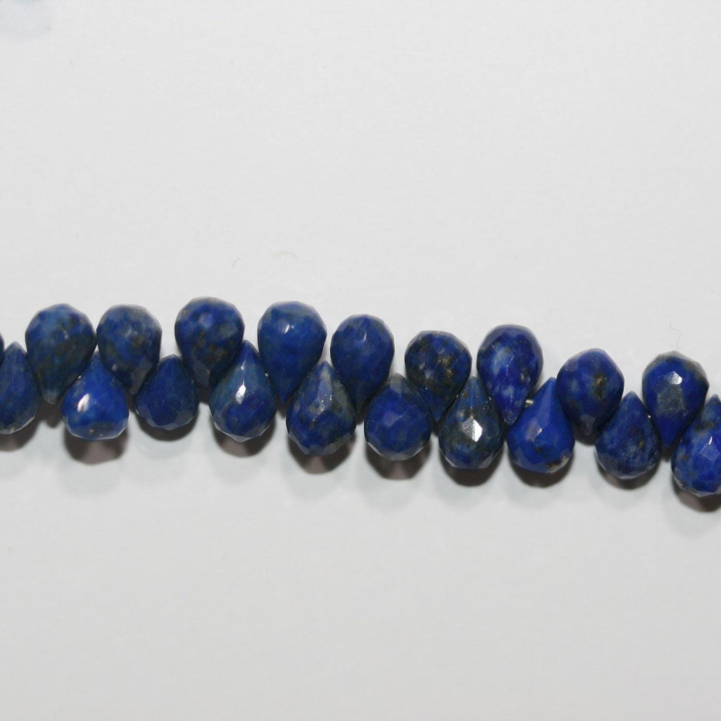Perles en lapis-lazuli facettées de 8 pouces (6 x 4 mm). Longueur du fil : environ 20 cm.