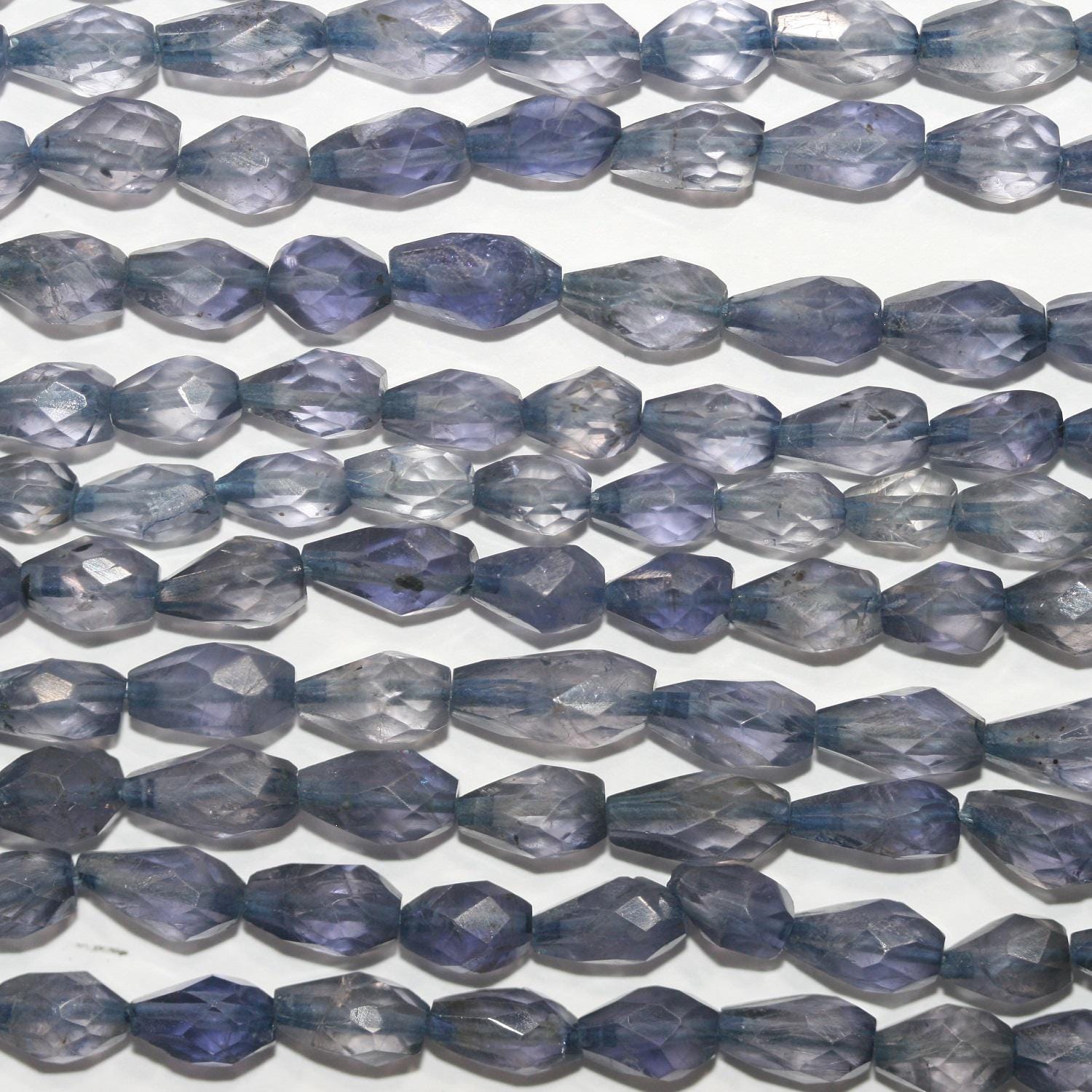13" St Iolite Faceted Drop Beads 7x5mm. Approx.-Strand 33cm.-Item.4908
