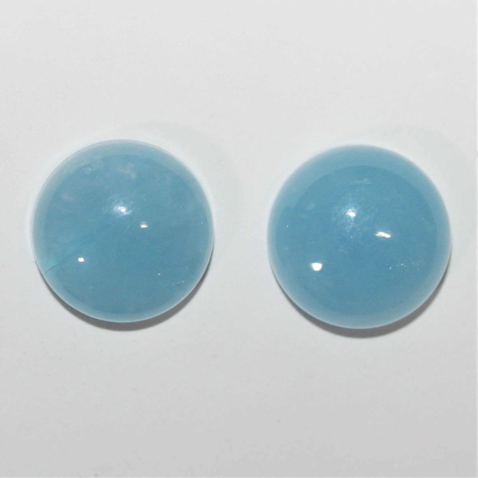 Pair of Aquamarine Smooth Round Cabochon 15mm. (2 pieces).