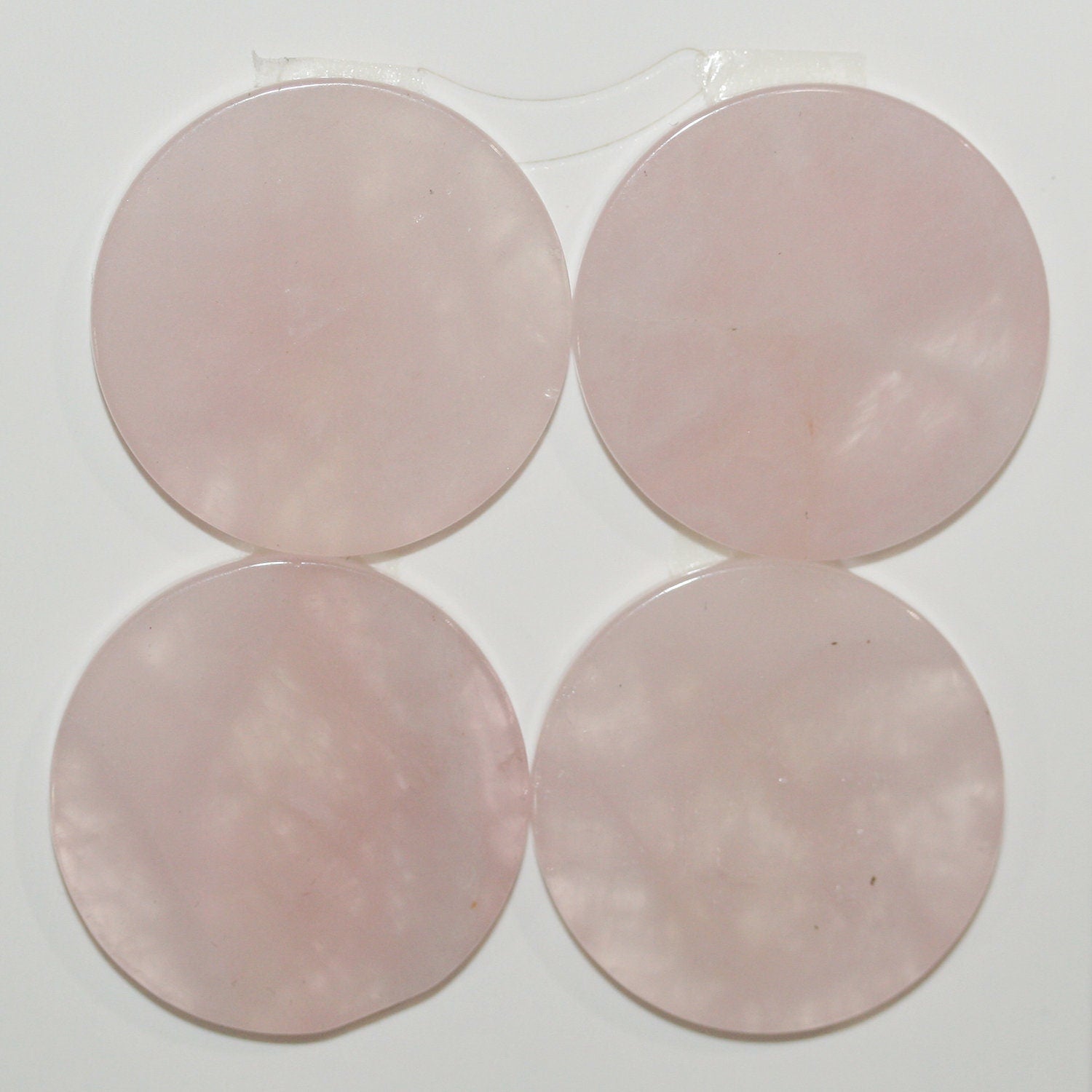 Lote de 4 cabujones de cuarzo rosa lisos de 25 mm. Grosor: 3 mm. (4 unidades).