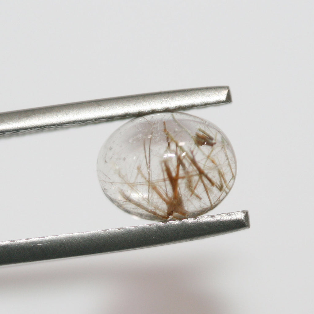 10 Pcs Lot Rutilated Quartz Oval Cabochon 9x7mm. (10 pcs.)