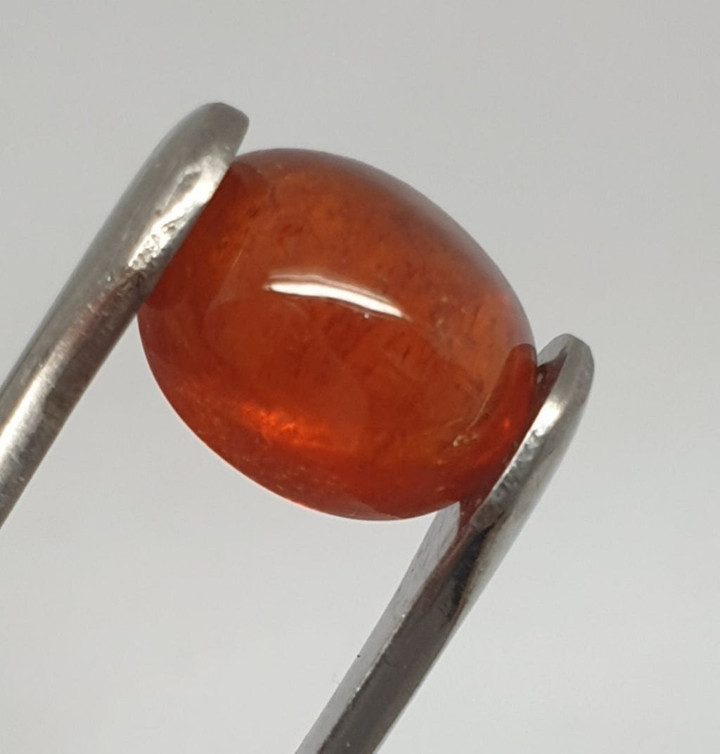 Spessartine Garnet Oval Cabochon 13x10.4mm. (10.34ct.).