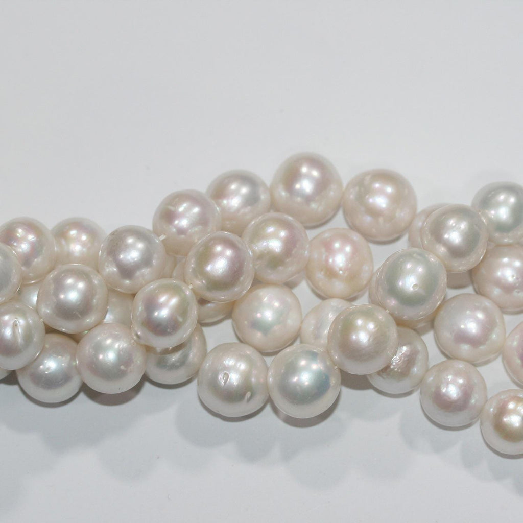 Perles rondes d'eau douce dégradées de 10 à 13 mm, 40 cm de diamètre. Collier de 40 cm. Perles naturelles à prix de gros.