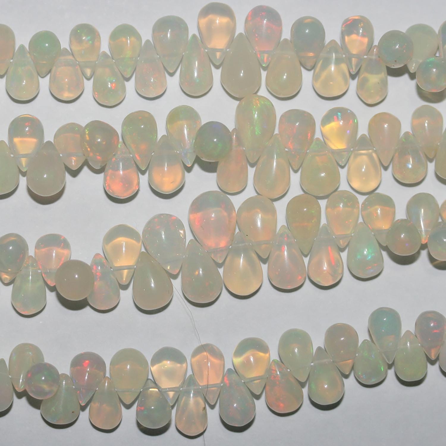 Cuentas de ópalo etíope de San Etiopía, lisas y graduadas, de 8" (6 x 4-10 x 7 mm, aprox.), tira de 20 cm