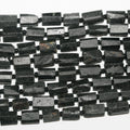 Cuentas de turmalina negra facetadas sin pulir, 16", 12 x 8 mm. Longitud aproximada: 40 cm.