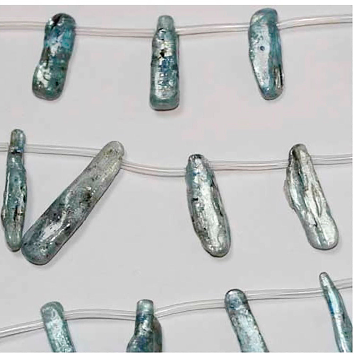 Cuentas lisas de cianita santa de 16", 37 x 8 mm (aprox.) - Tira de 40 cm