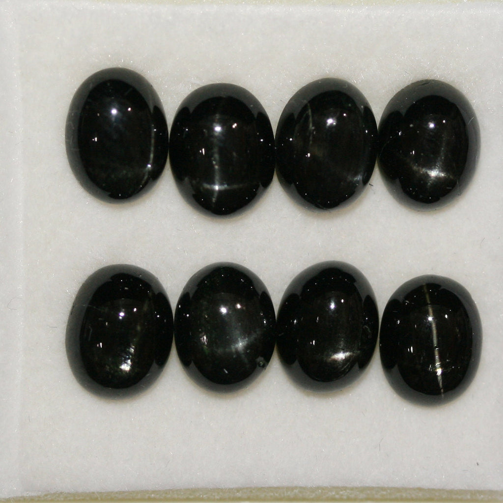 Lote de 8 cabujones ovalados de diópsido estrella de 9 x 7 mm. (8 uds.)