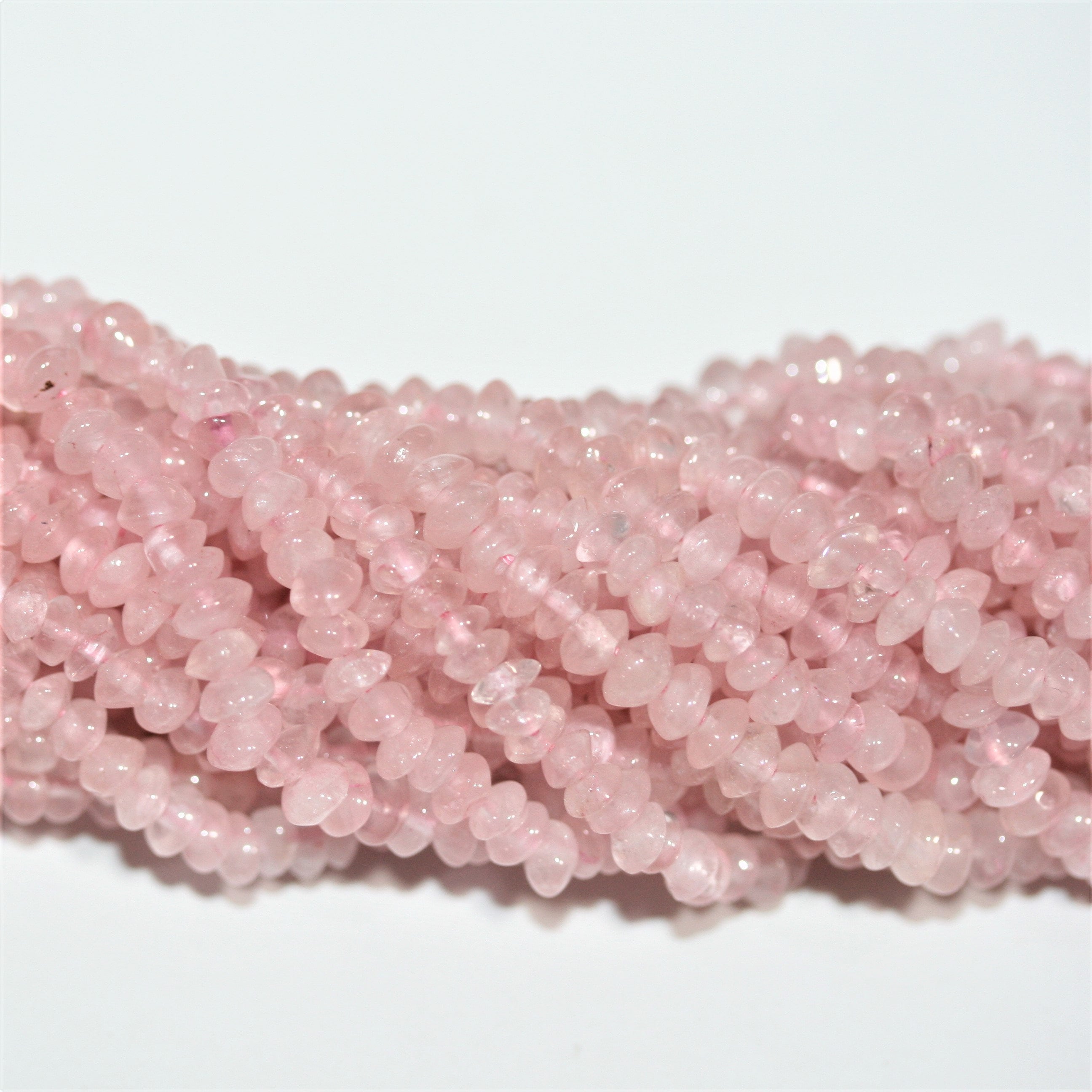 Perles rondelles lisses en quartz rose 4x2mm - Fil de 36cm.