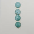Lote de 4 cabujones redondos lisos de Larimar de 10 mm. (4 piezas).
