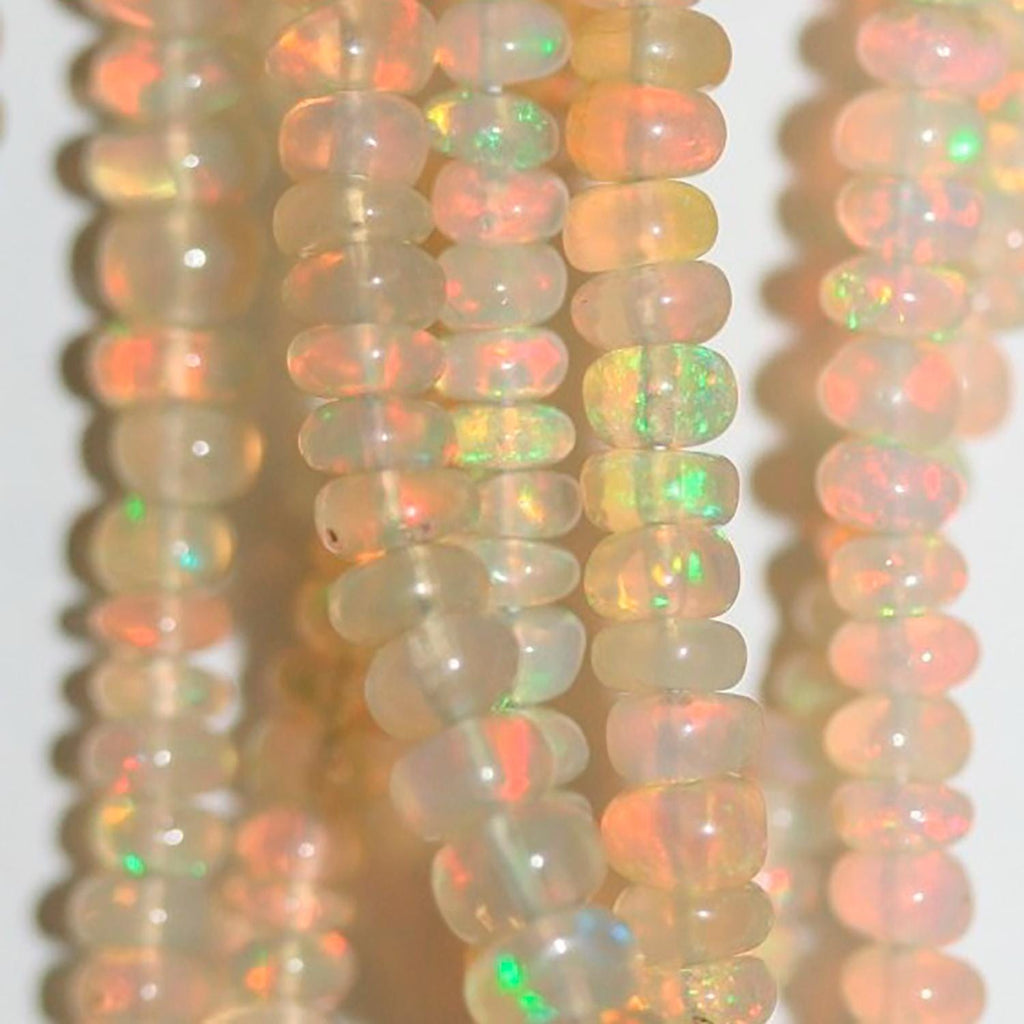 Perles rondelles lisses et graduées en opale éthiopienne St, 40 cm (16 pouces), dimensions : 2,5 x 1,5 à 6 x 3 mm. Longueur du fil : environ 40 cm.