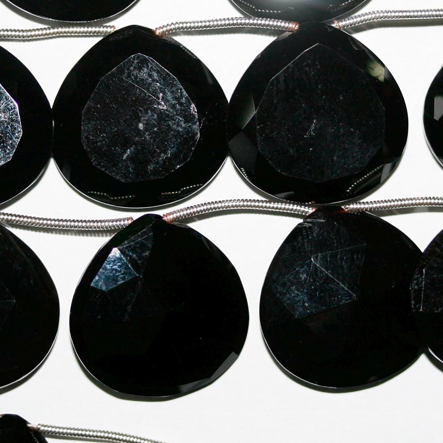 Cuentas facetadas de calcedonia negra de 8" x 22 mm - Aprox. - Hilo de 20 cm.