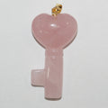 Pendentif clé en quartz rose lisse 40x22mm.