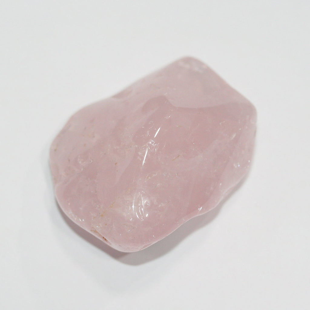 Pendentif irrégulier en quartz rose brut, environ 45 x 30 mm (1 pièce).