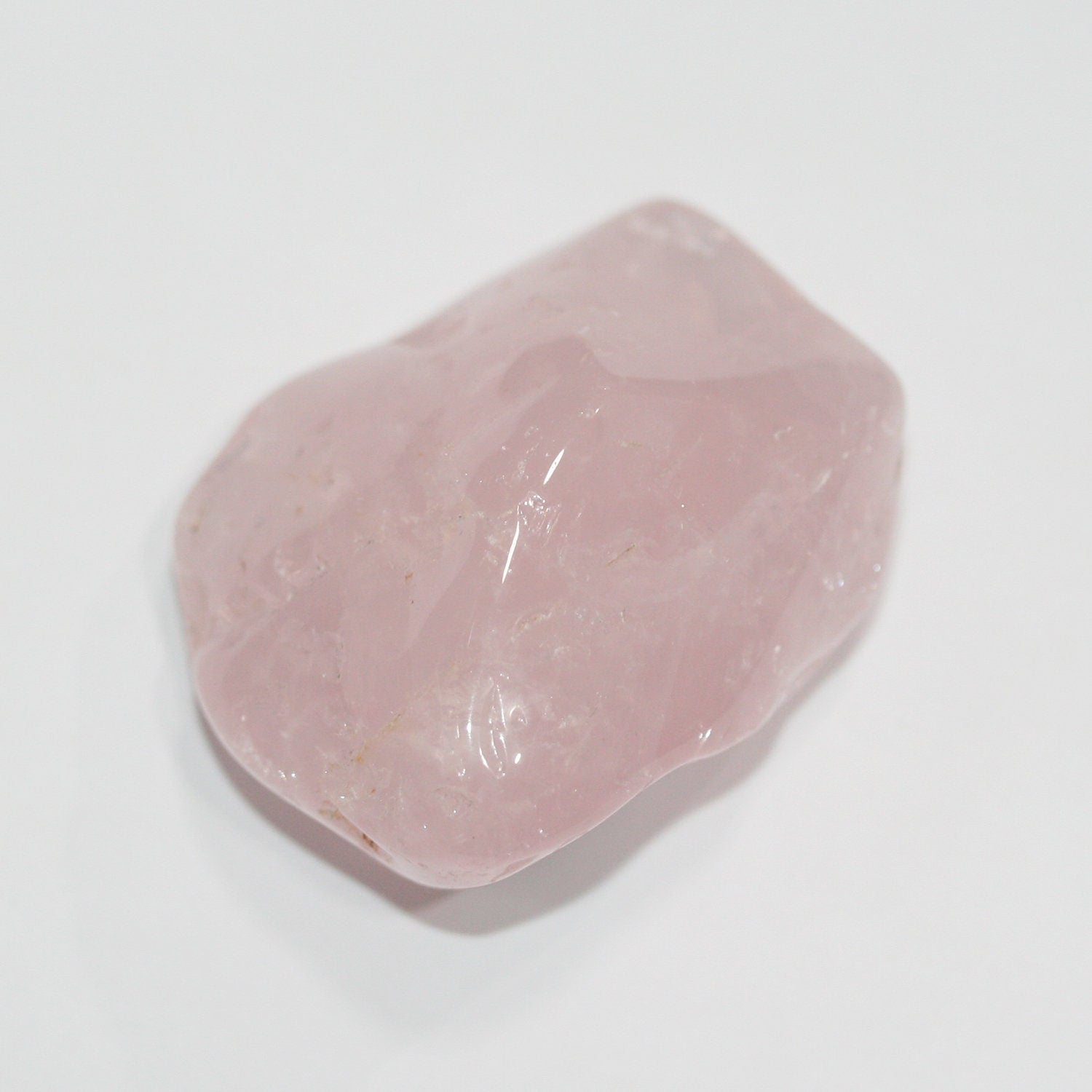 Pendentif irrégulier en quartz rose brut, environ 45 x 30 mm (1 pièce).