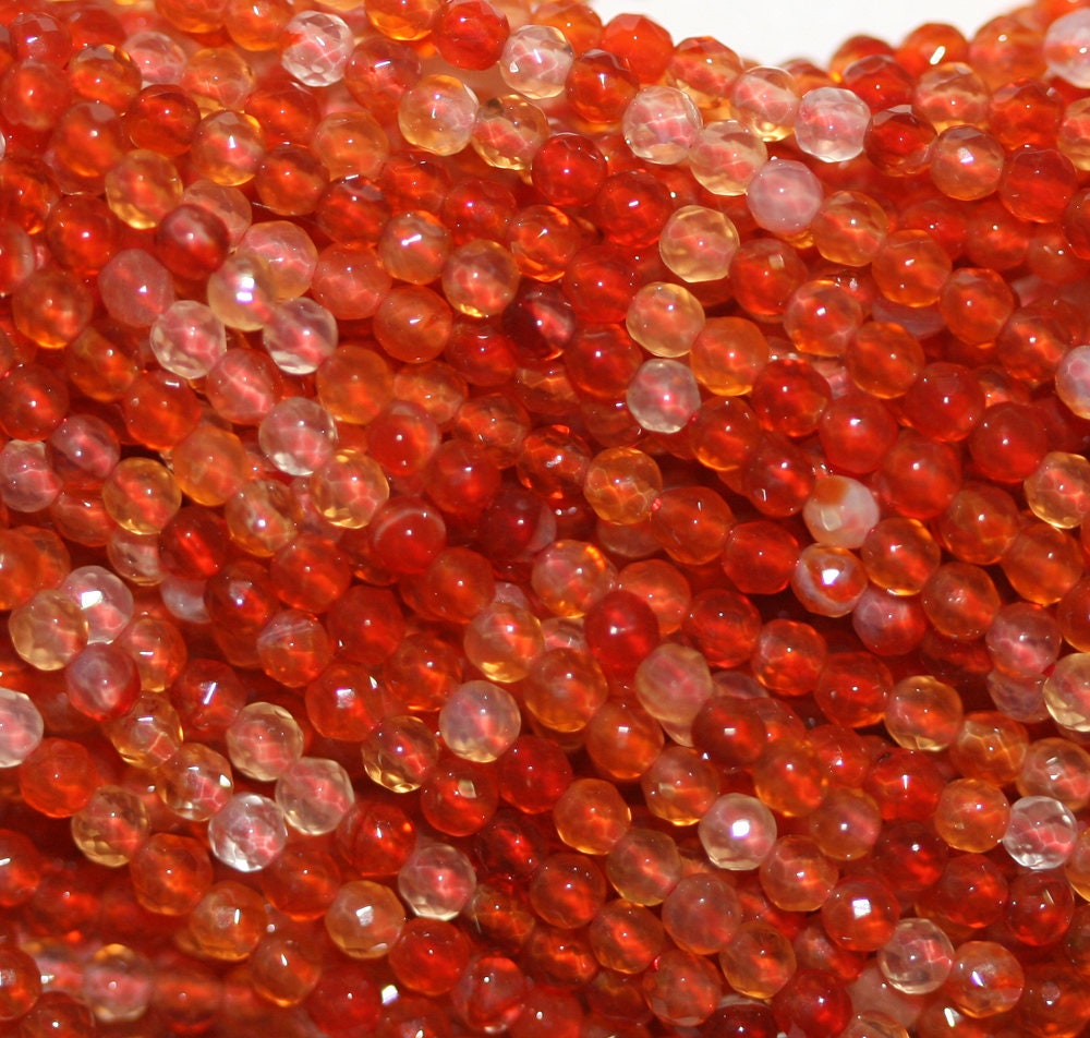 15" Brin de perles rondes à facettes en cornaline de 2 mm.