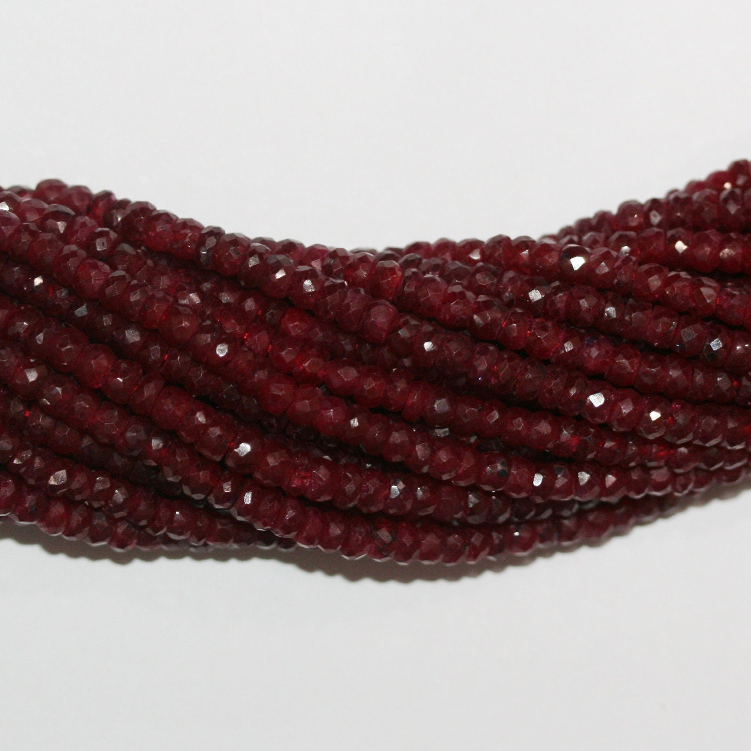 13" St Ruby Faceted Rondelle Beads 4x2mm.-Strand 33cm.