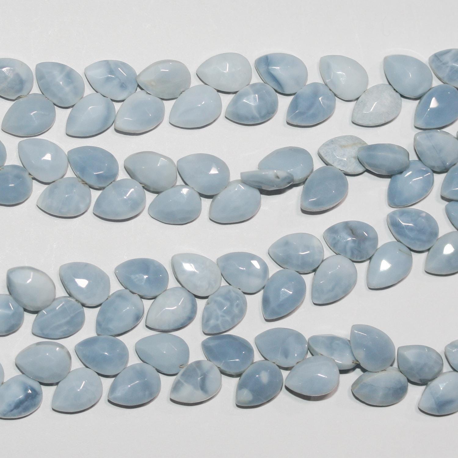 Cuentas de ópalo azul facetadas de 8" (10 x 6 mm) - Hilo de 20 cm