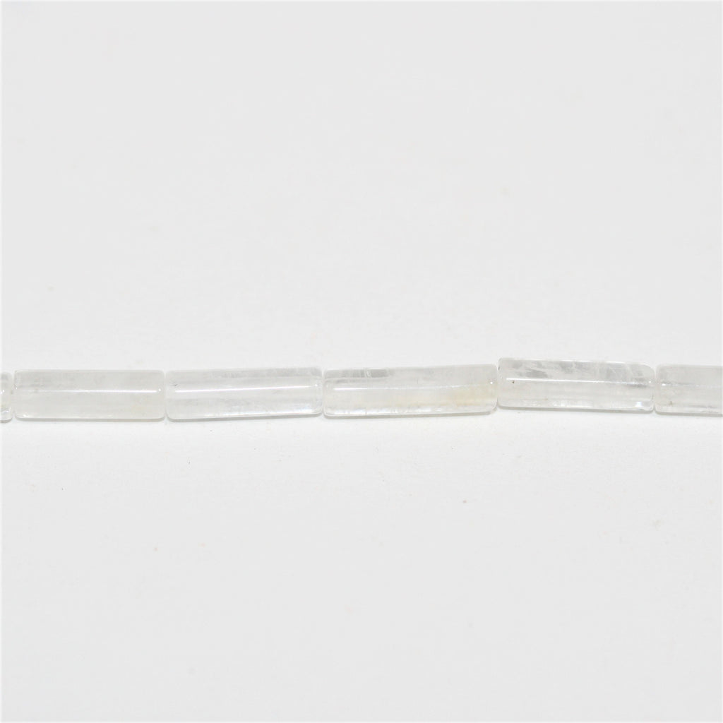 Perles tubulaires lisses en cristal de roche de 15 pouces, 13 x 4 mm. - Brin de 39 cm.