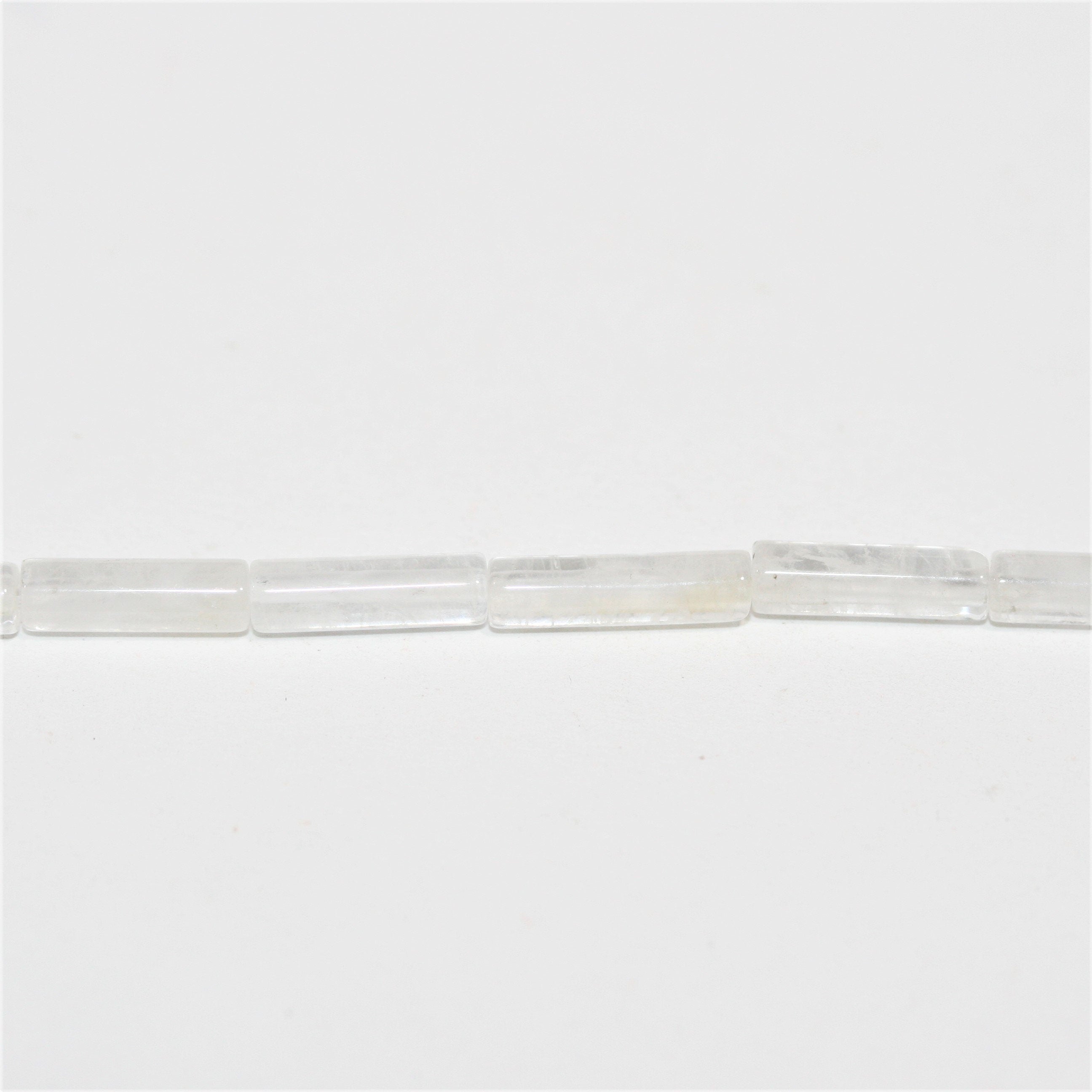 Perles tubulaires lisses en cristal de roche de 15 pouces, 13 x 4 mm. - Brin de 39 cm.