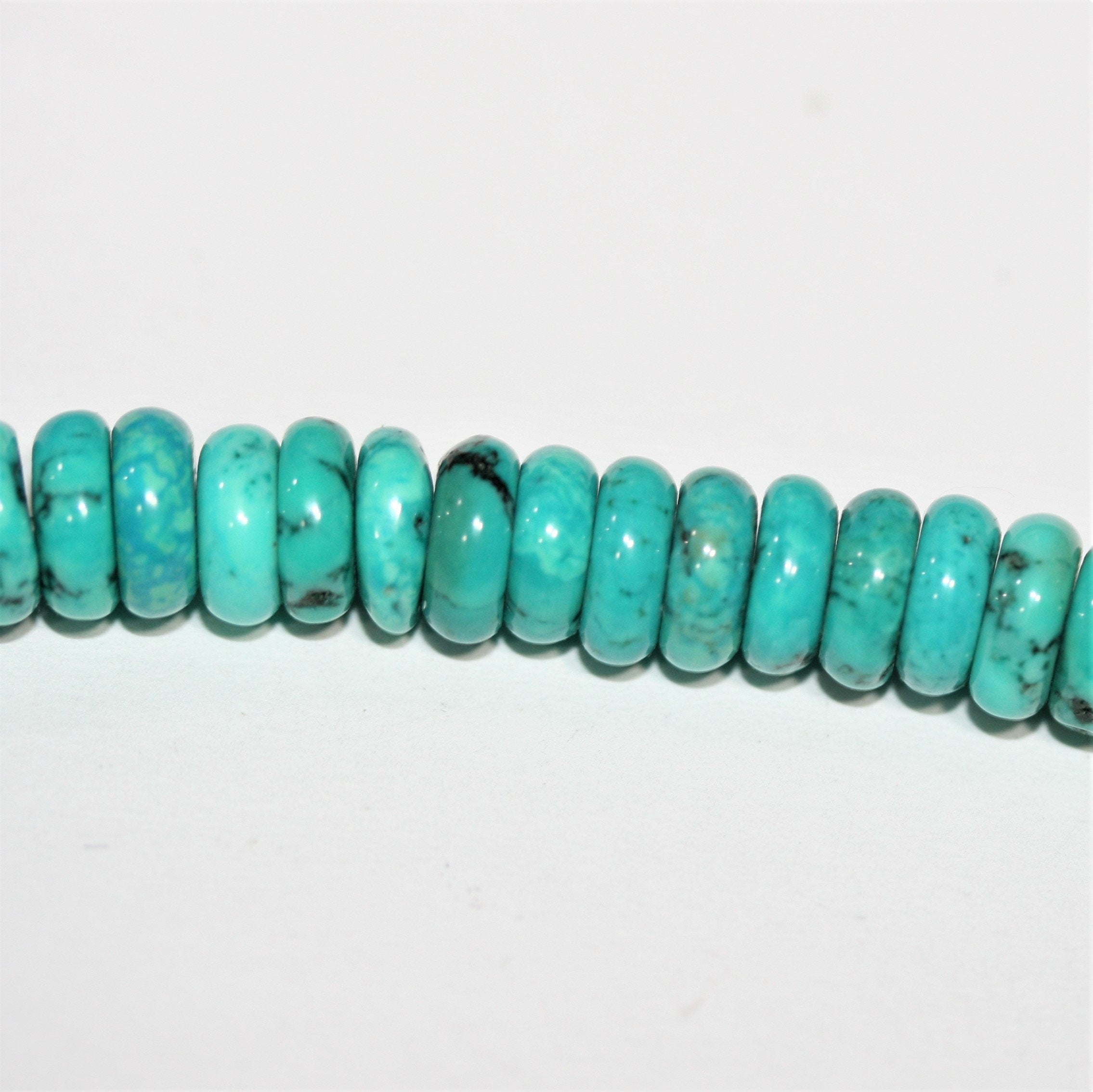 Cuentas redondas lisas de turquesa St. de 16" de 8 x 3 mm - Hilo de 41 cm.