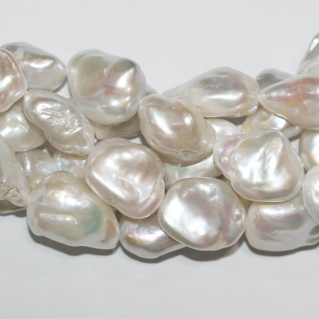 Perla Barroca de Agua Dulce de 16" (25 x 18 mm). Hilo aproximado de 40 cm. Precios al por mayor.