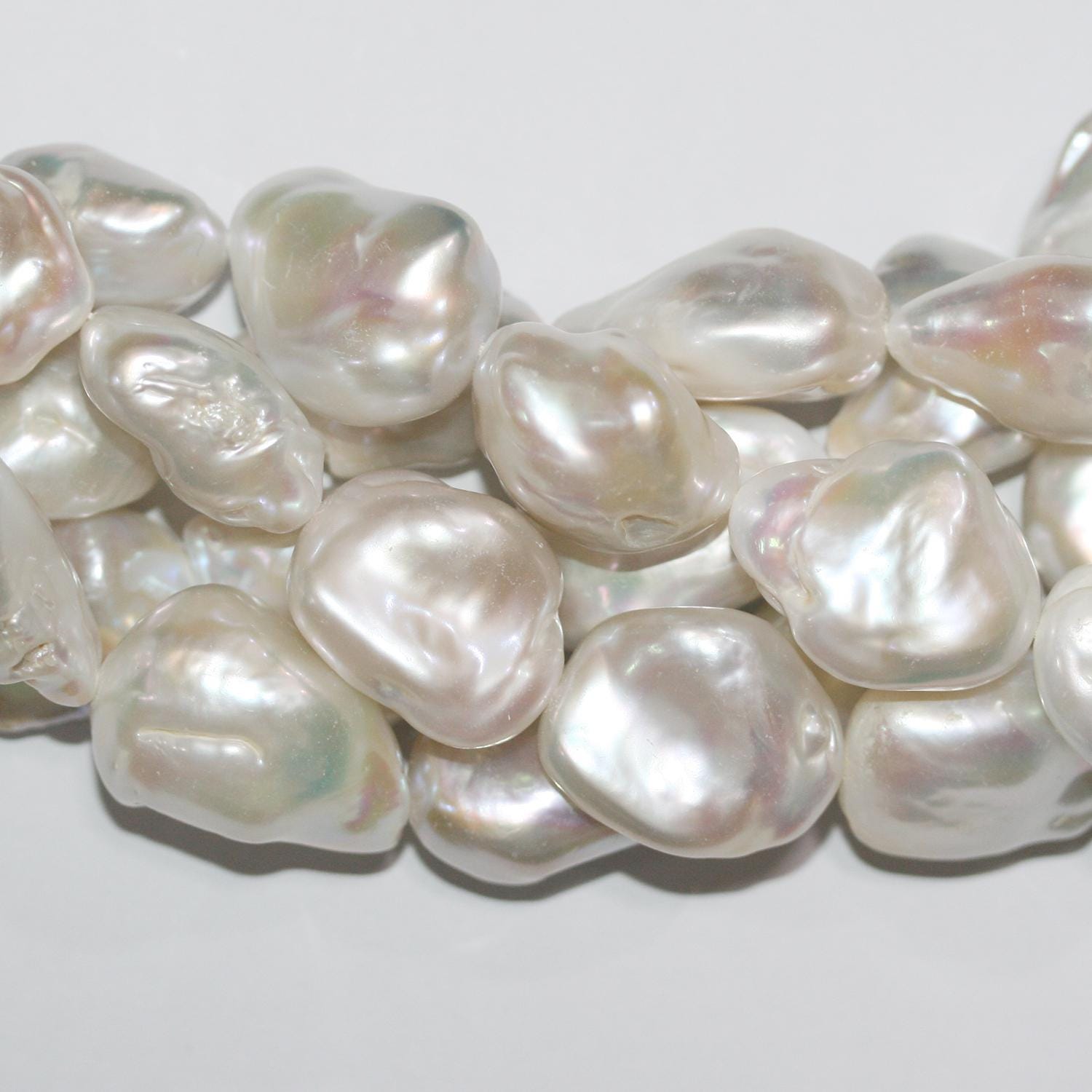 Perles baroques d'eau douce St 16" (environ 40 cm), 25 x 18 mm. Longueur du fil : 40 cm environ. Perles naturelles à prix de gros.