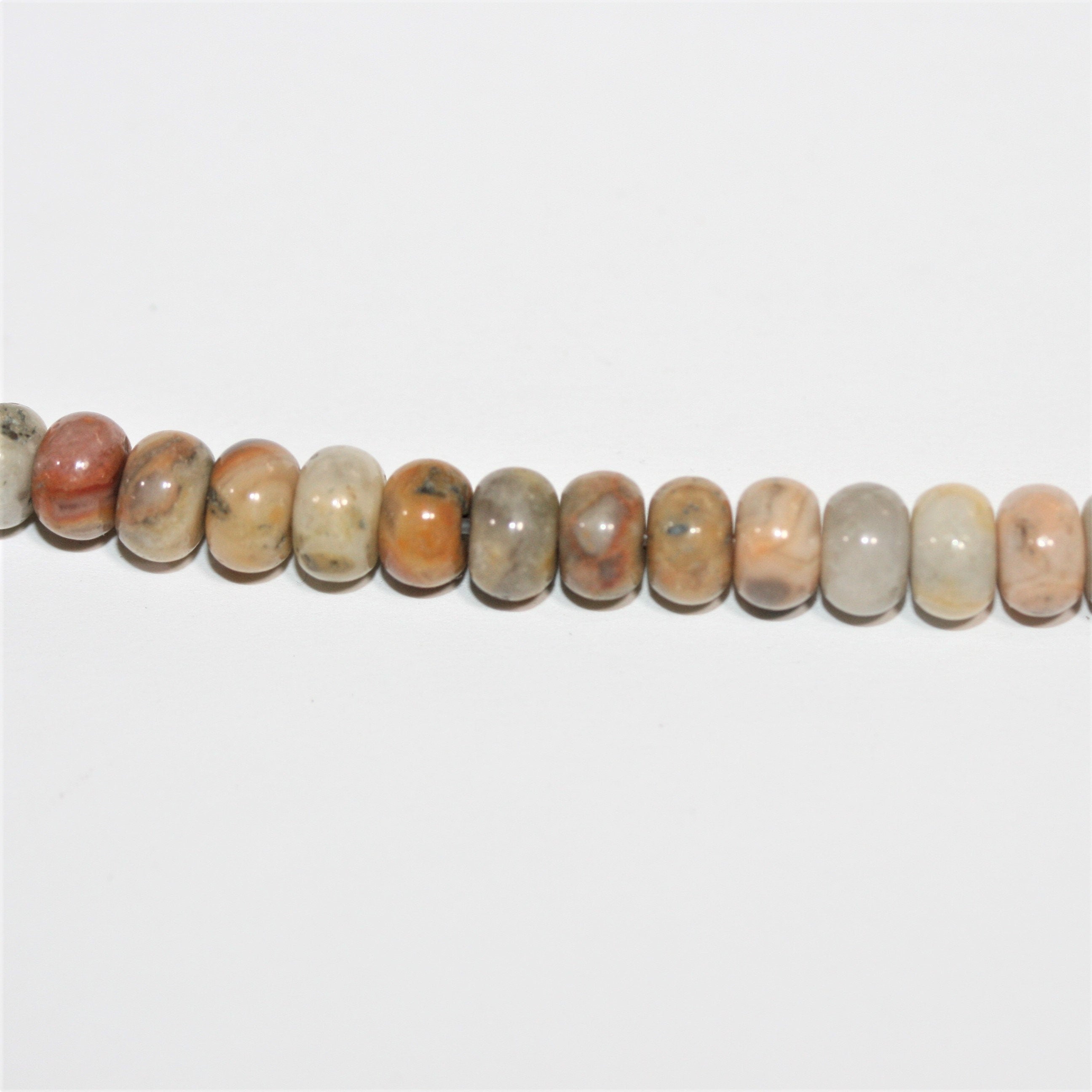 Perles rondelles lisses en agate folle St 15" 6x4mm.- Brin 38cm.