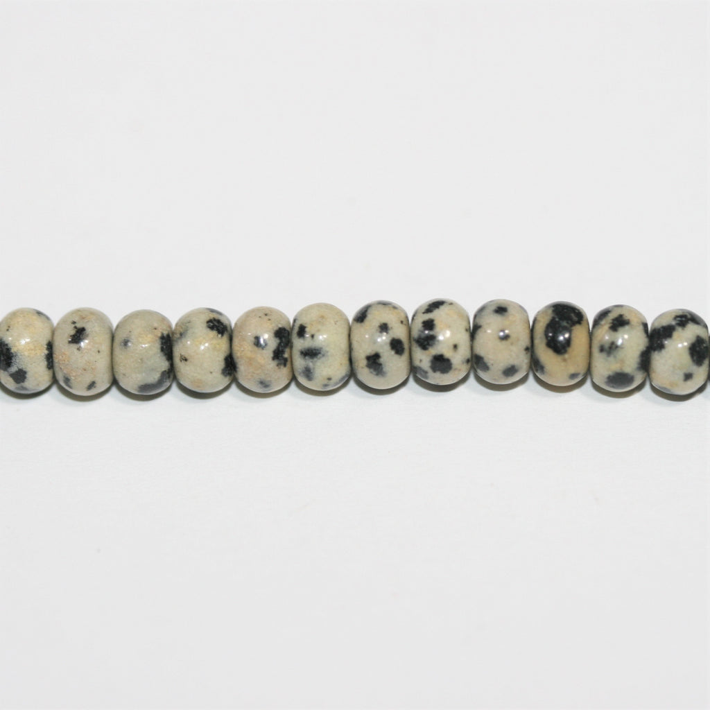 Perles rondelles lisses en jaspe Saint-Dalmatien 15" 6x4mm.- Brin 39cm.