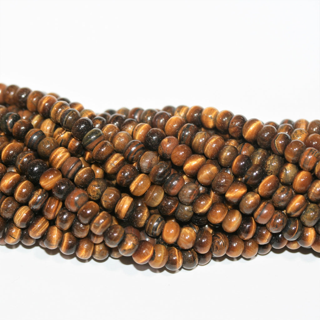 Perles rondelles lisses œil de tigre St 15" 6x4mm.- Brin 39cm.