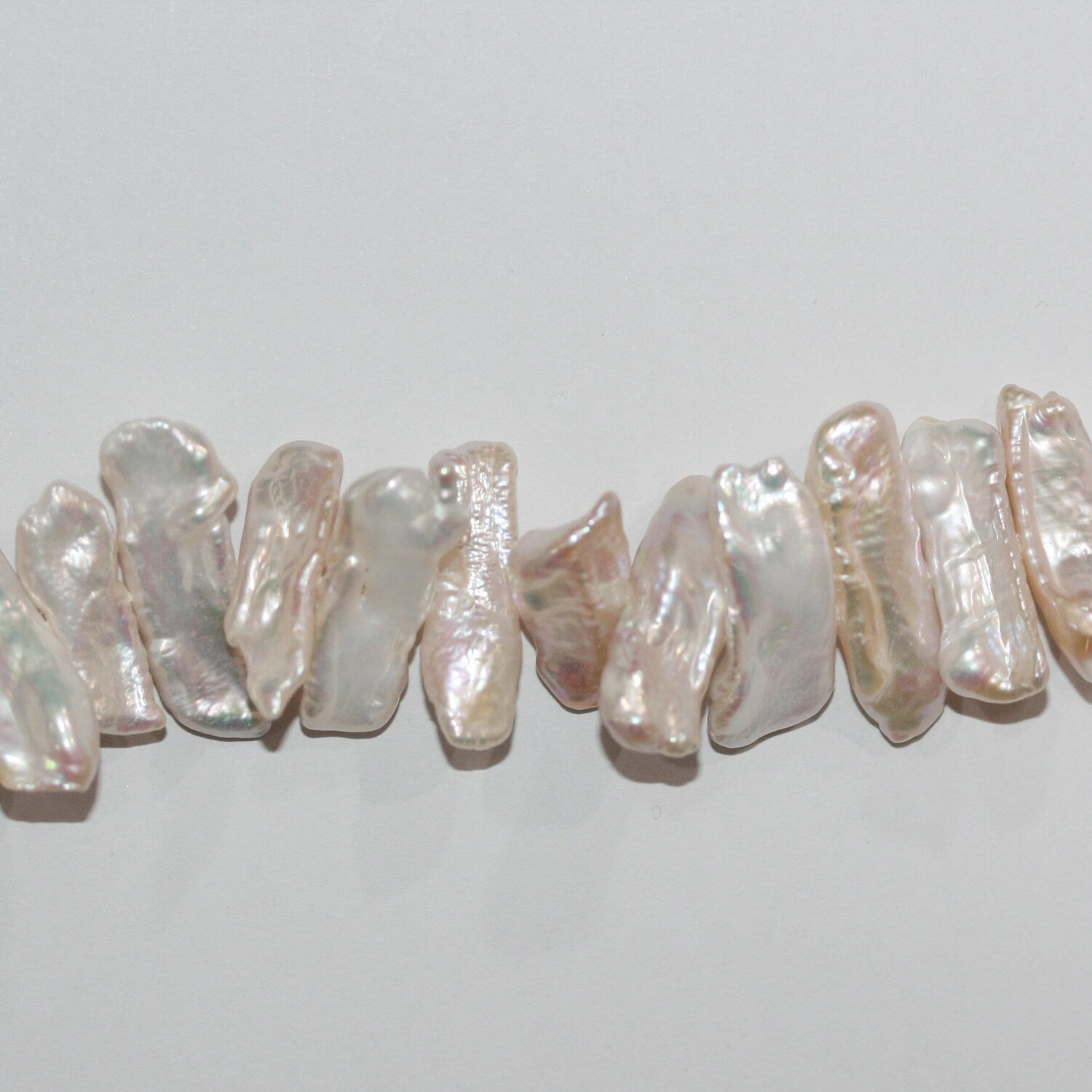 Perles de culture d'eau douce Biwas, 15 pouces (environ 38 cm), 25 x 8 mm. Collier de 38 cm environ. Perles naturelles à prix de gros.