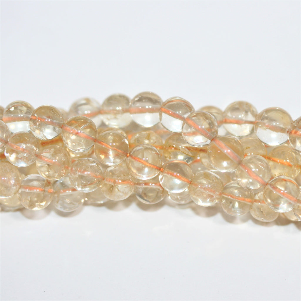 Perles rondes lisses de citrine 7-8 mm.- Fil 36 cm.