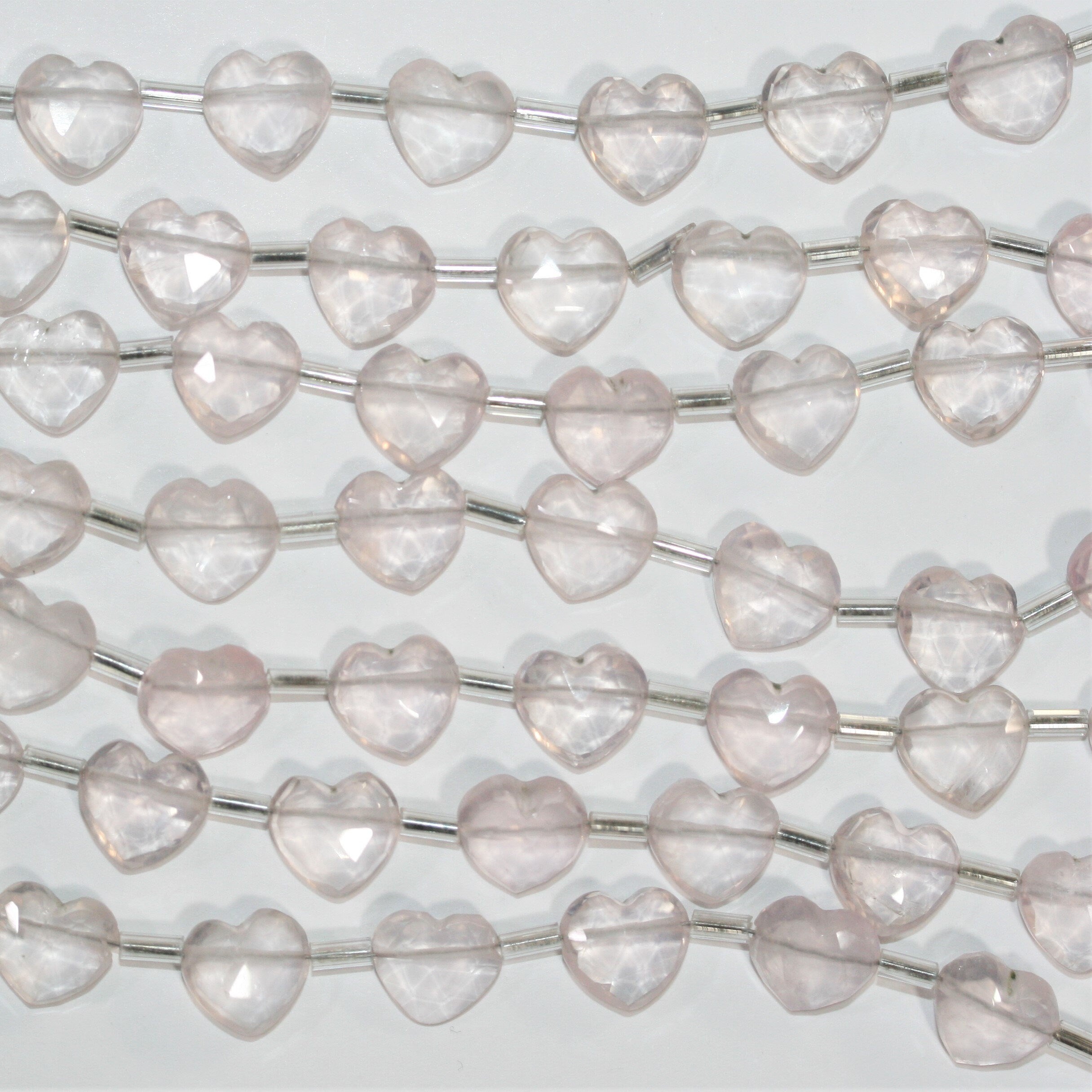 Cuentas de corazón facetadas de cuarzo rosa de 7" de 9 a 10 mm - Hilo de 17 cm.
