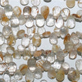 Perles en quartz rutile facettées de 20 cm (8 po), 8 x 5 mm environ. Longueur du fil : 22 cm.