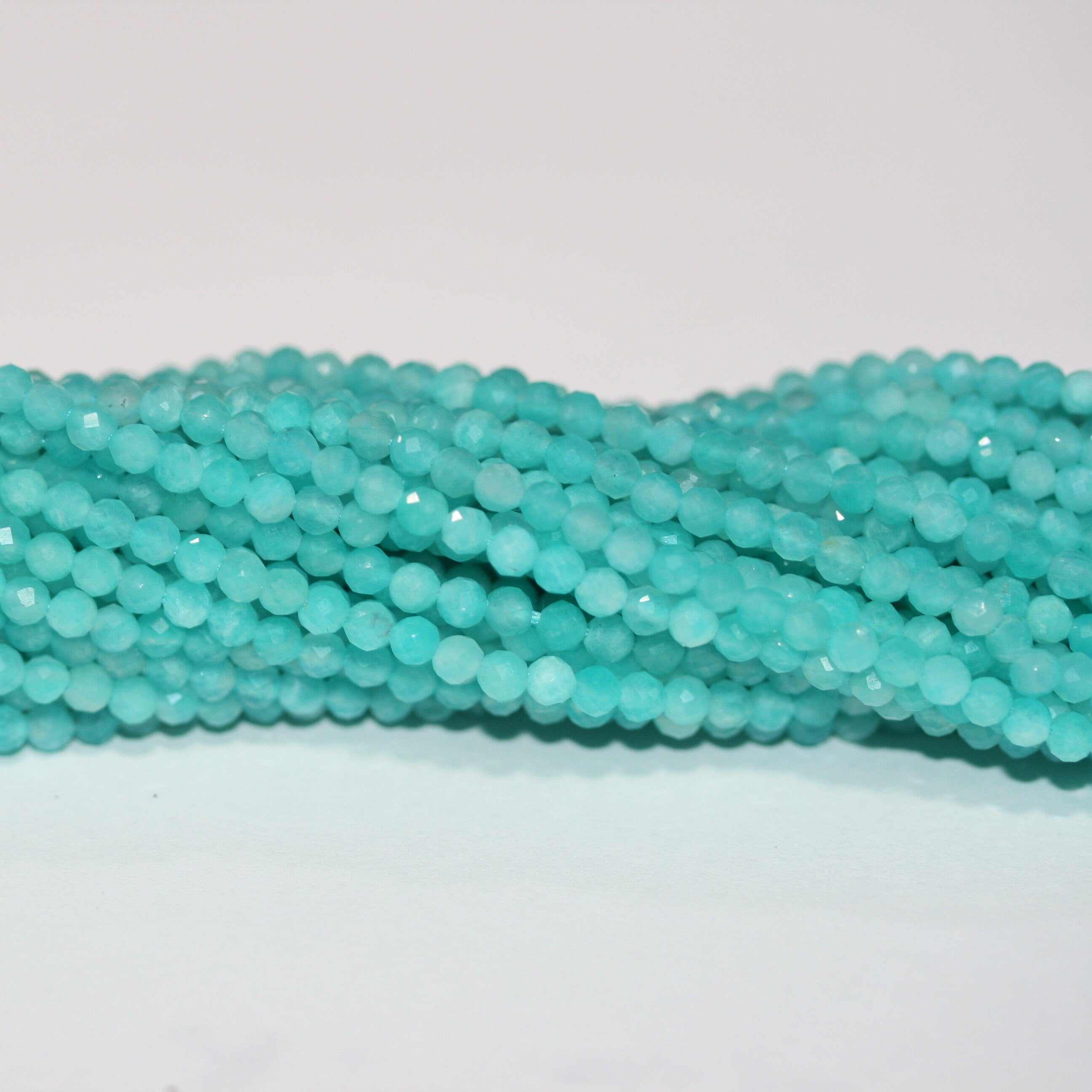 13" St Amazonite Faceted Round Beads 2.5-3mm.-Strand 32cm.
