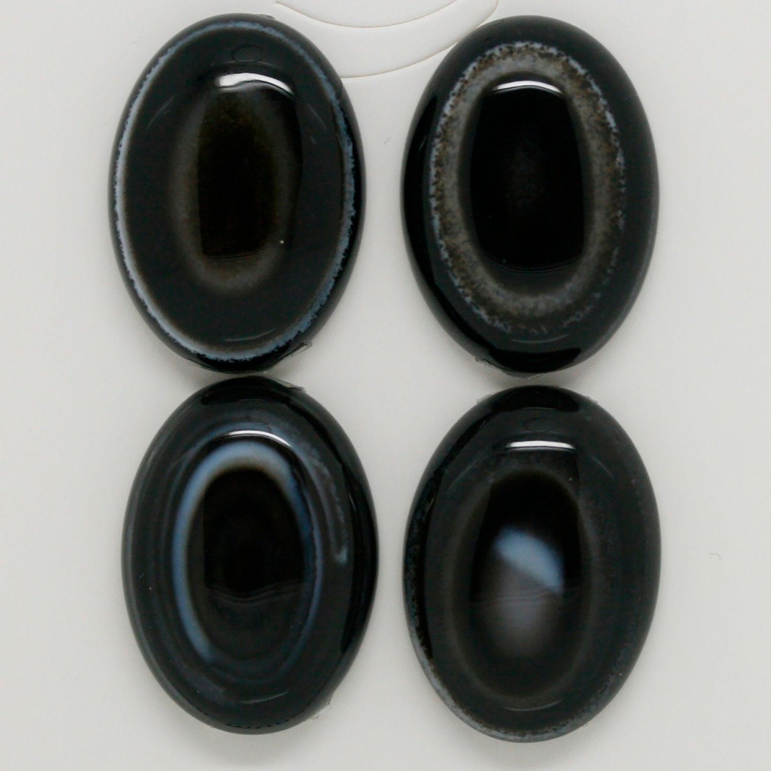 Lote de 4 cabujones ovalados de ágata tibetana de 25 x 18 mm. (4 uds.)