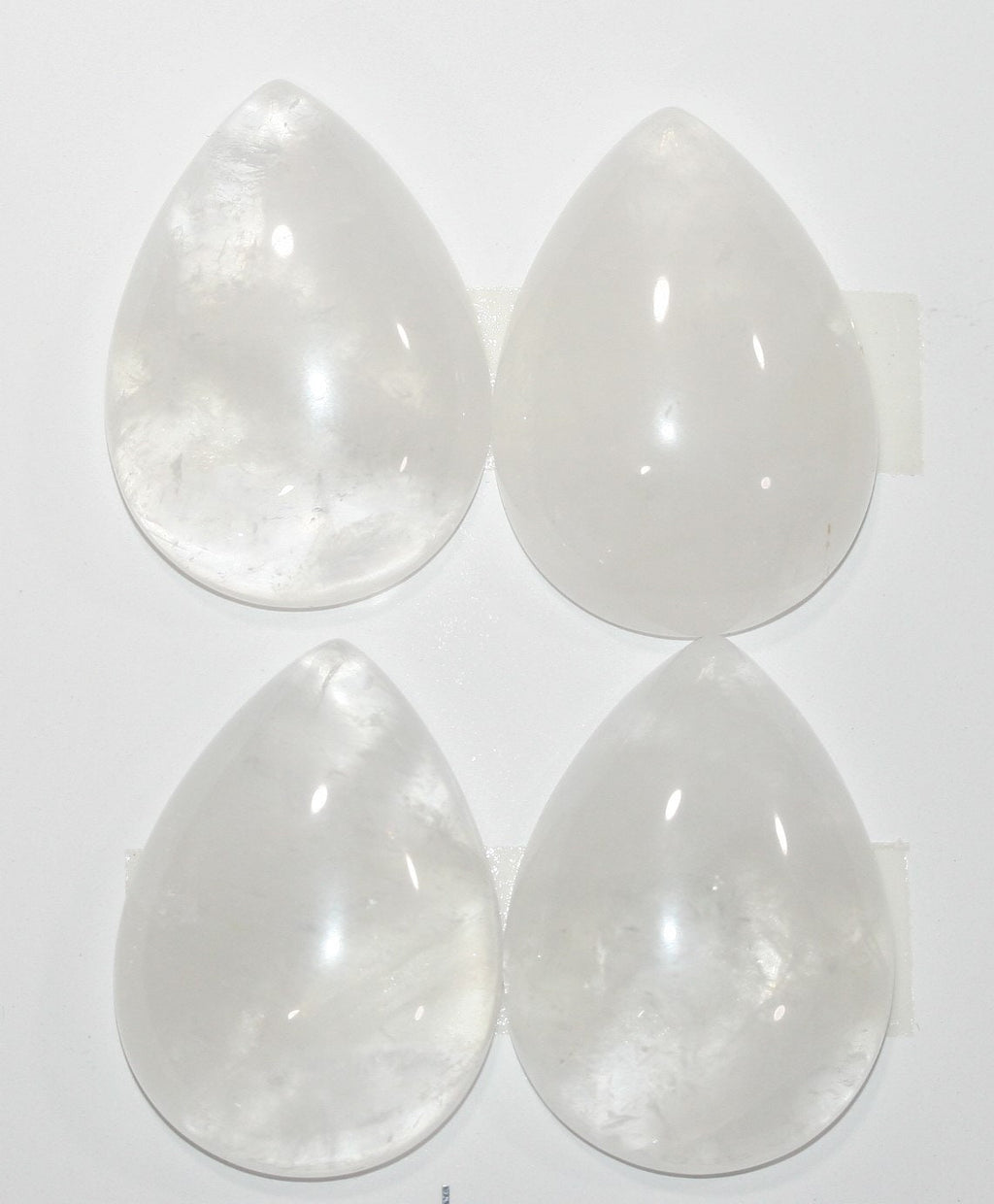 Lote de 4 cabujones de cuarzo cristal de roca lisos de 25 x 18 mm. (4 piezas).