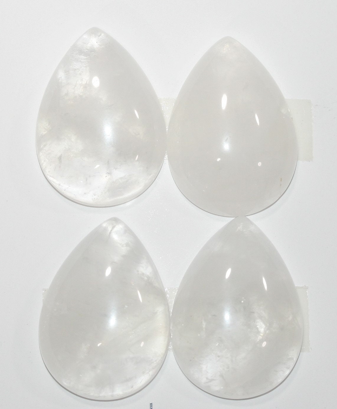Lote de 4 cabujones de cuarzo cristal de roca lisos de 25 x 18 mm. (4 piezas).
