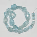 Perles de pépites d'aigue-marine AAA 14" St à facettes graduées de 9 à 20 mm environ - Fil de 35 cm.