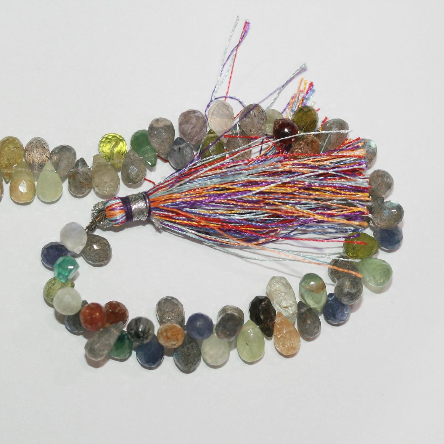 Cuentas facetadas multipiedra de 18 cm (7"), 12 x 6 mm (aprox. - Hilo de 20 cm)